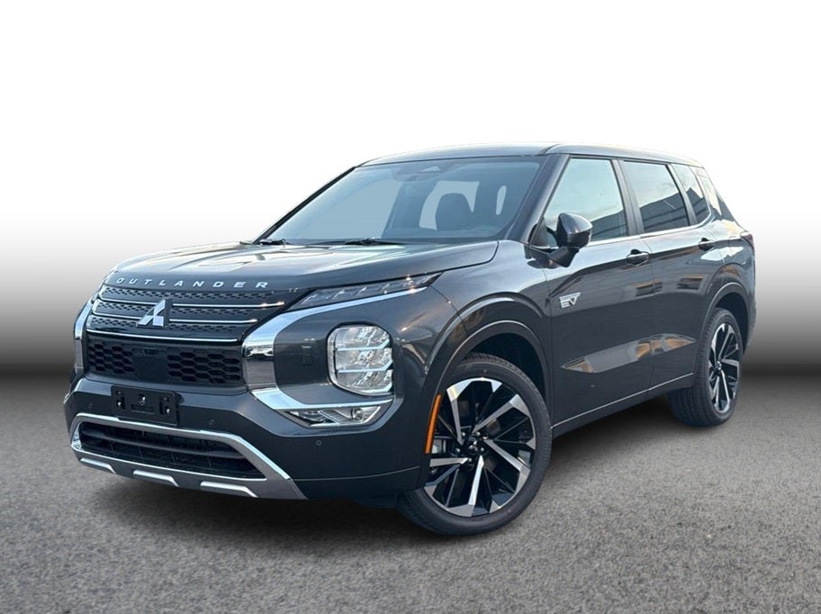 2025 Mitsubishi Outlander PHEV SE in Gray — front three-quarter view