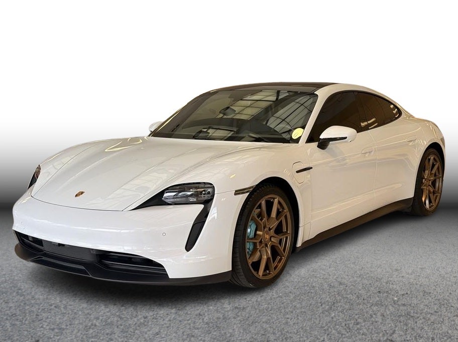 2023 Porsche Taycan Sedan 4D in White — front three-quarter view