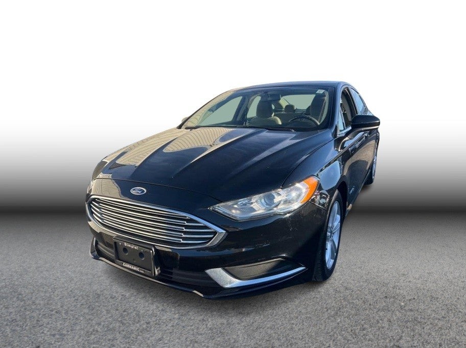 2018 Ford Fusion S Hybrid Sedan 4D in Black — front three-quarter view
