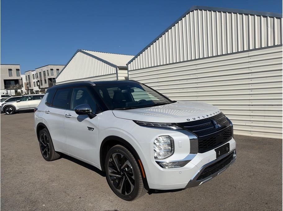 2025 Mitsubishi Outlander PHEV — rear three-quarter view