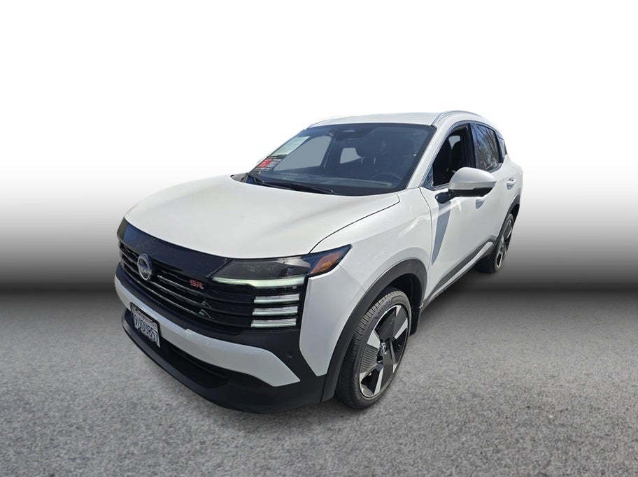 2025 Nissan Kicks SR Sport Utility 4D in White — front three-quarter view