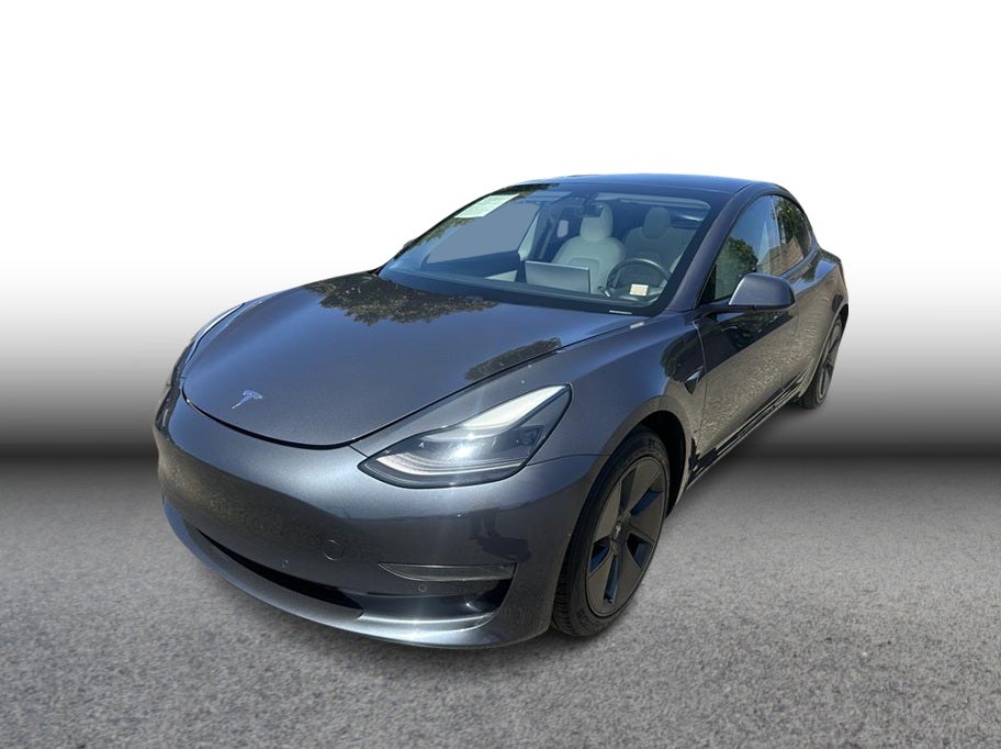 2021 Tesla Model 3 Standard Range Plus Sedan 4D in Gray — front three-quarter view