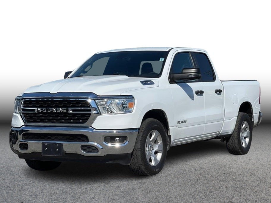 2023 RAM 1500 Quad Cab Big Horn Pickup 4D 6 1/3 ft in White — front three-quarter view