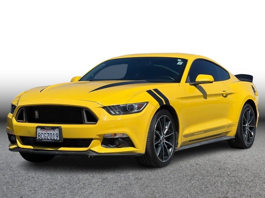 2016 Ford Mustang EcoBoost Coupe 2D in Yellow — front three-quarter view