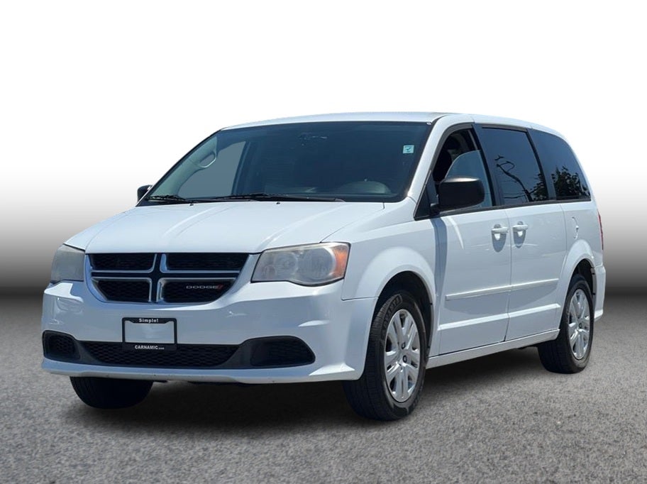 2017 Dodge Grand Caravan Passenger SE Minivan 4D in White — front three-quarter view