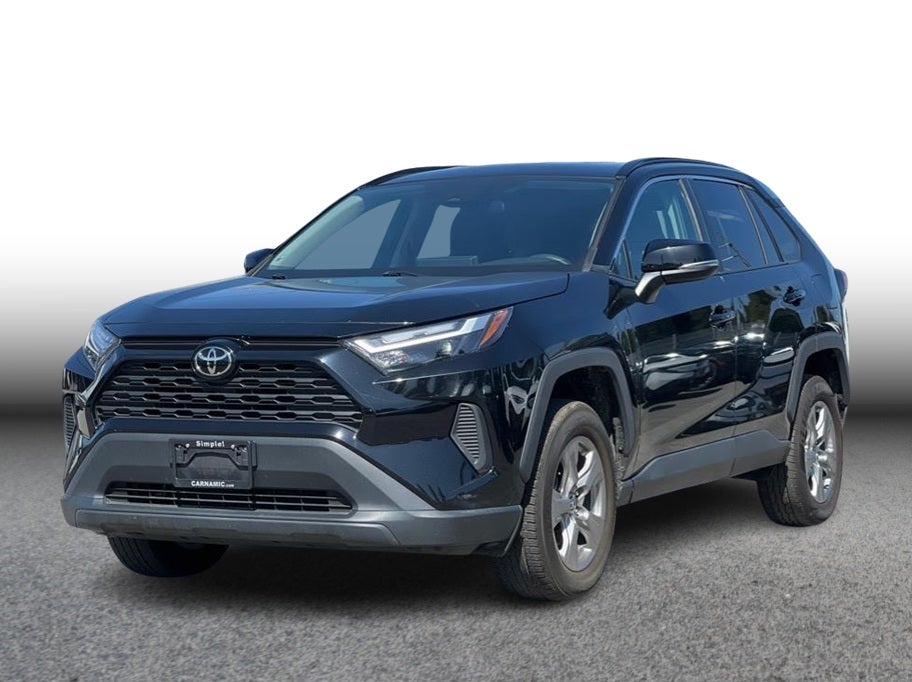 2024 Toyota RAV4 XLE Sport Utility 4D in Black — front three-quarter view