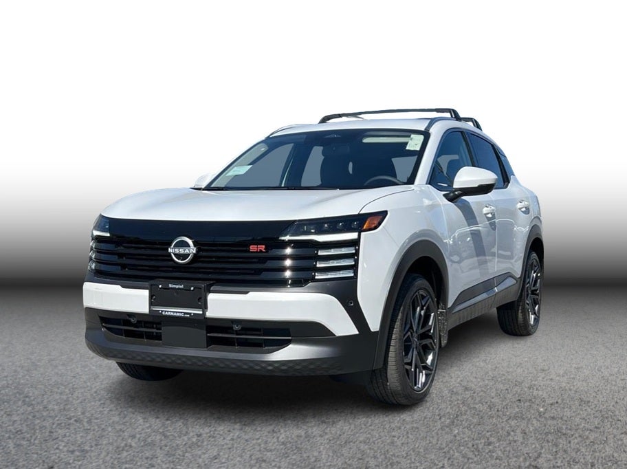 2025 Nissan Kicks SR in Aspen White Tricoat — front three-quarter view