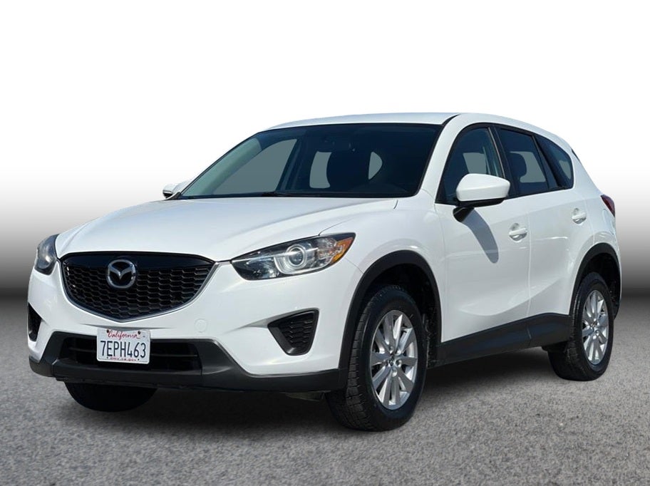 2014 Mazda Mazda CX-5 Sport SUV 4D in White — front three-quarter view