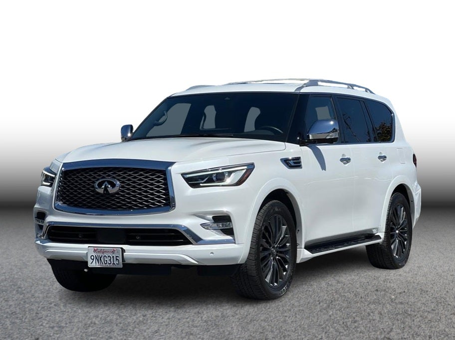 2024 INFINITI QX80 SENSORY Sport Utility 4D in White — front three-quarter view