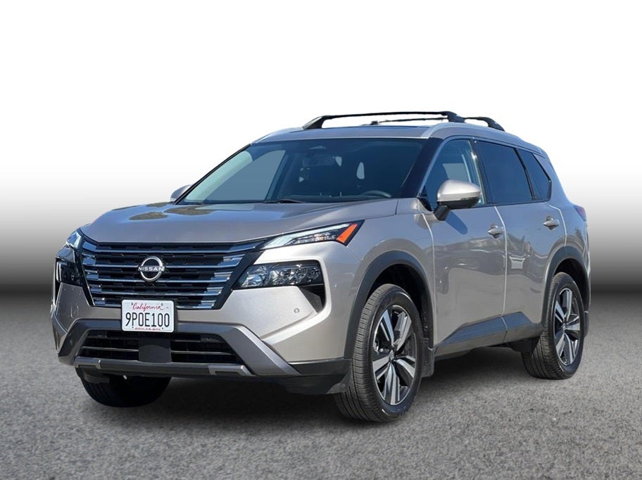 2024 Nissan Rogue SL Sport Utility 4D in Tan — front three-quarter view